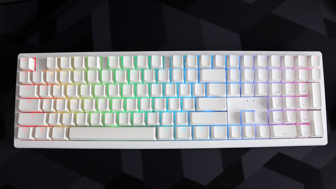 Ducky Zero 6108 gaming keyboard in white on a desk.