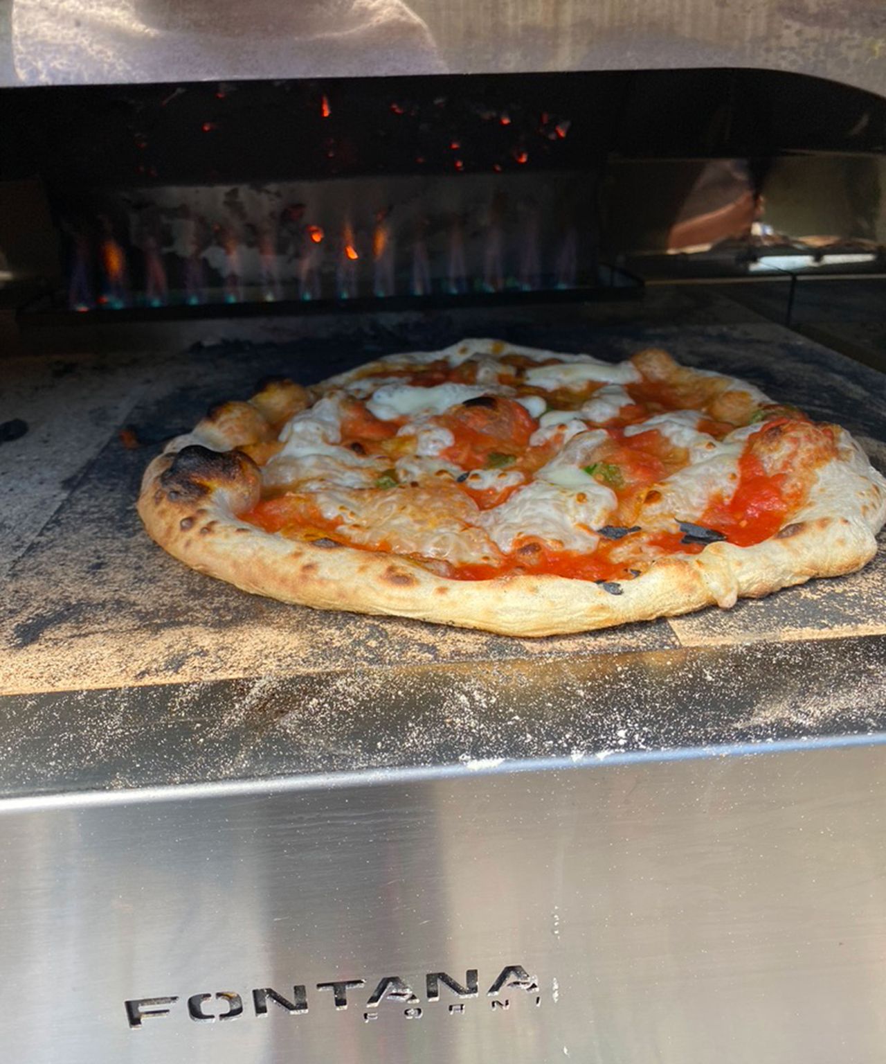 Pizza oven vs pizza stone which is best for your yard? Gardeningetc