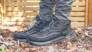 Side shot of the Timberland Motion Access Mid Waterproof Sneakers (black) shown on the reviewers feet