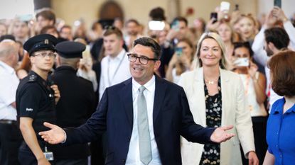 Andy Burnham, British Labour MP for Makerfield, celebrates after his swearing-in at the Houses of Parliament