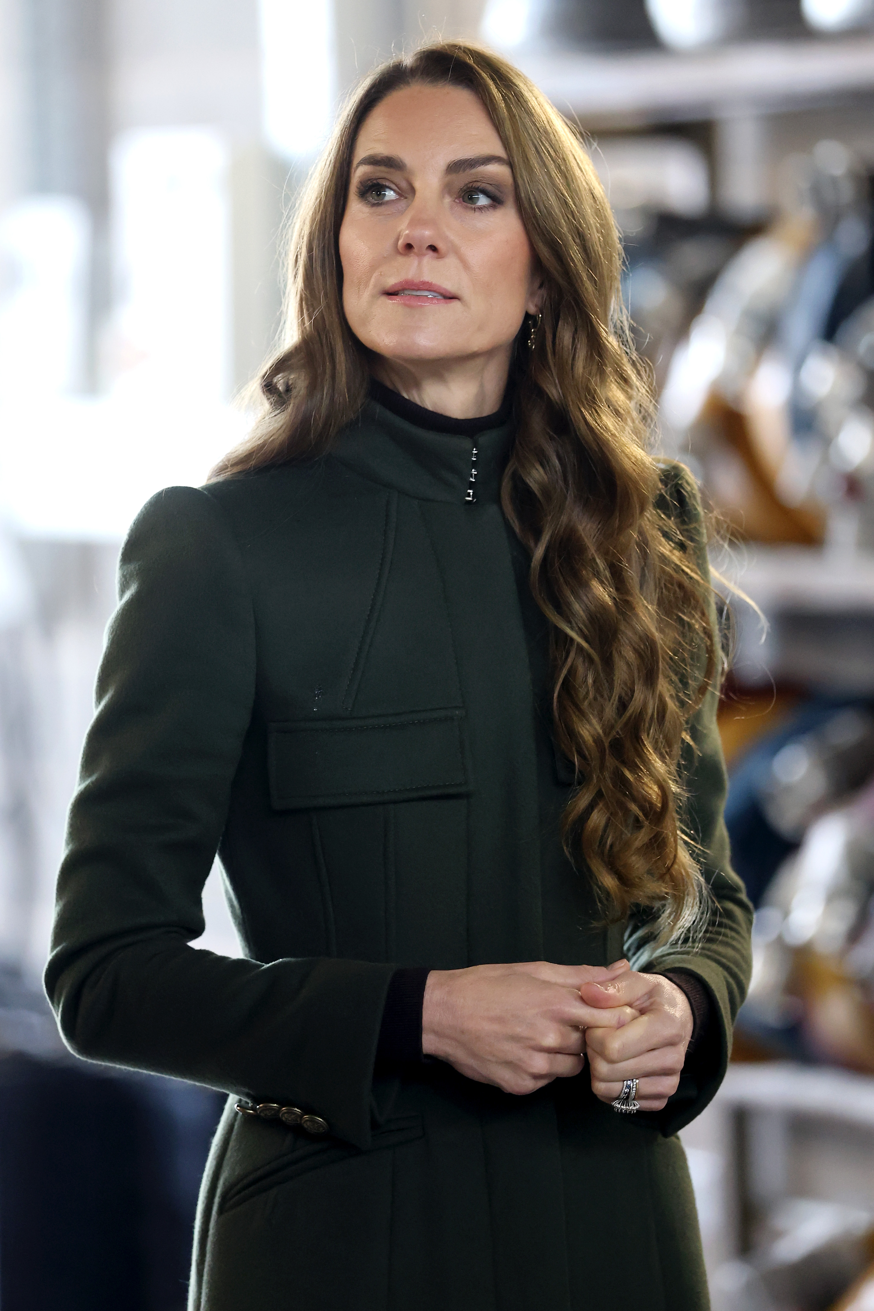 Kate Middleton wearing a green coat