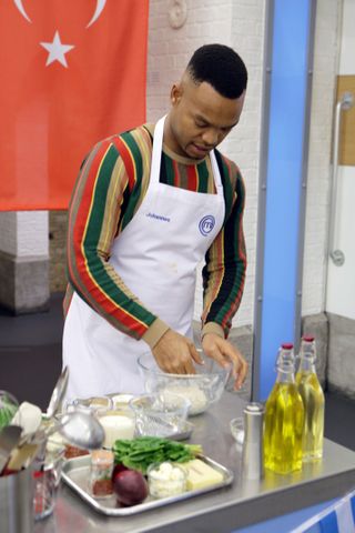 Joannes Radebe cooking on Celebrity MasterChef