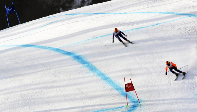 Kelly Gallagher and Charlotte Evans stay connected on the slope.