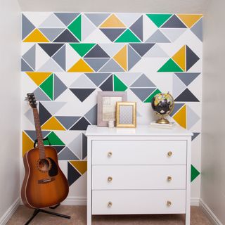 Vinyl in triangle shapes on wall