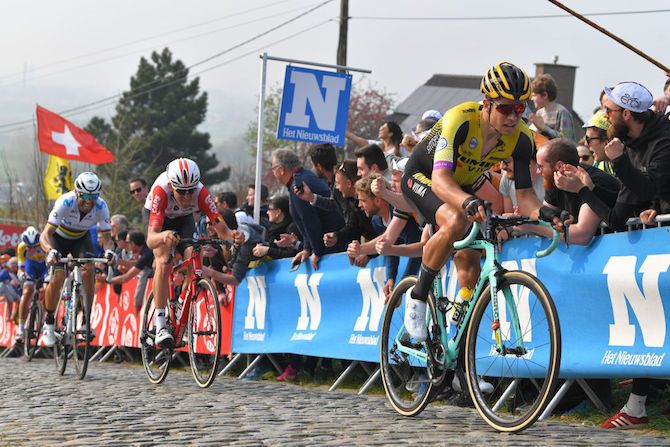 Jumbo-Visma's Wout van Aert opens a gap to Tiesj Benoot (Lotto Soudal) and Alejandro Valverde (Movistar) at the 2019 Tour of Flanders
