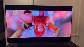 A scene from Toy Story 3 being shown on the Samsung S95F.