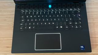 Close up on keyboard and trackpad on Alienware M16 R2 gaming laptop