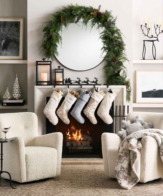 Pottery Barn cozy Christmas living room, decorated fireplace
