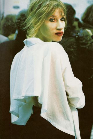 image from Inge Grognard make-up book, showing woman with red lips and a white shirt