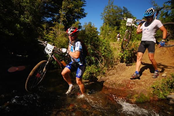 Patricio Fernandez crosses a stream.