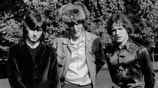 From left, Eric Clapton, Ginger Baker (1939-2019) and Jack Bruce (1943-2014) of British rock band Cream posed together in Green Park, London, in July 1966. (