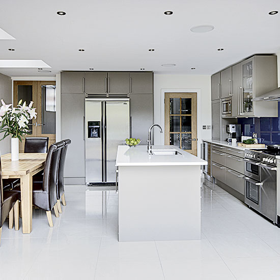 kitchen area with white flooring and white ceiling
