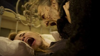 Alison Lohman as Christine and Lorna Raver as Ganush in Drag Me to Hell