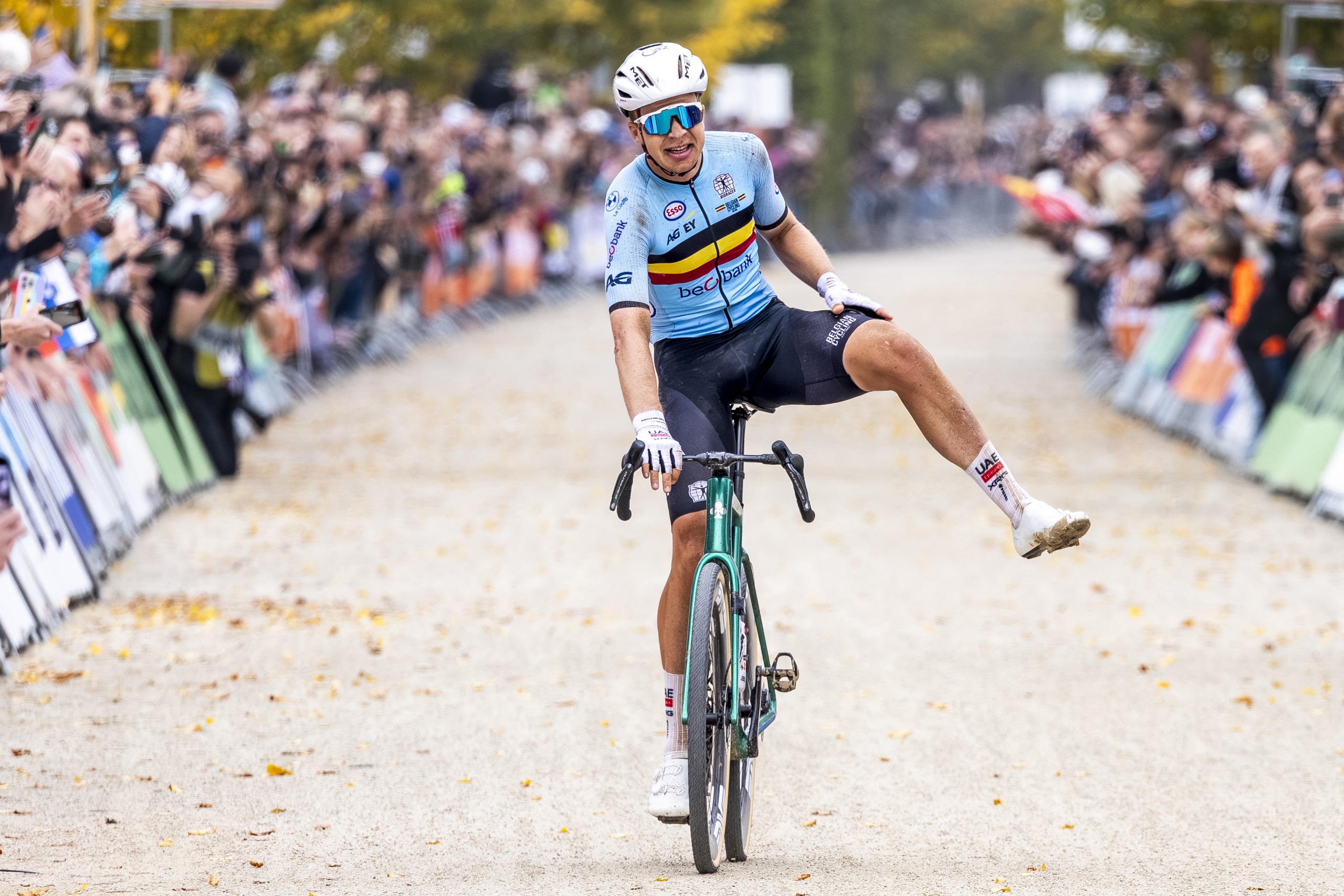 Florian Vermeersch celebrates victory as he crosses the line solo in Maastricht at the 2025 UCI Gravel World Championships