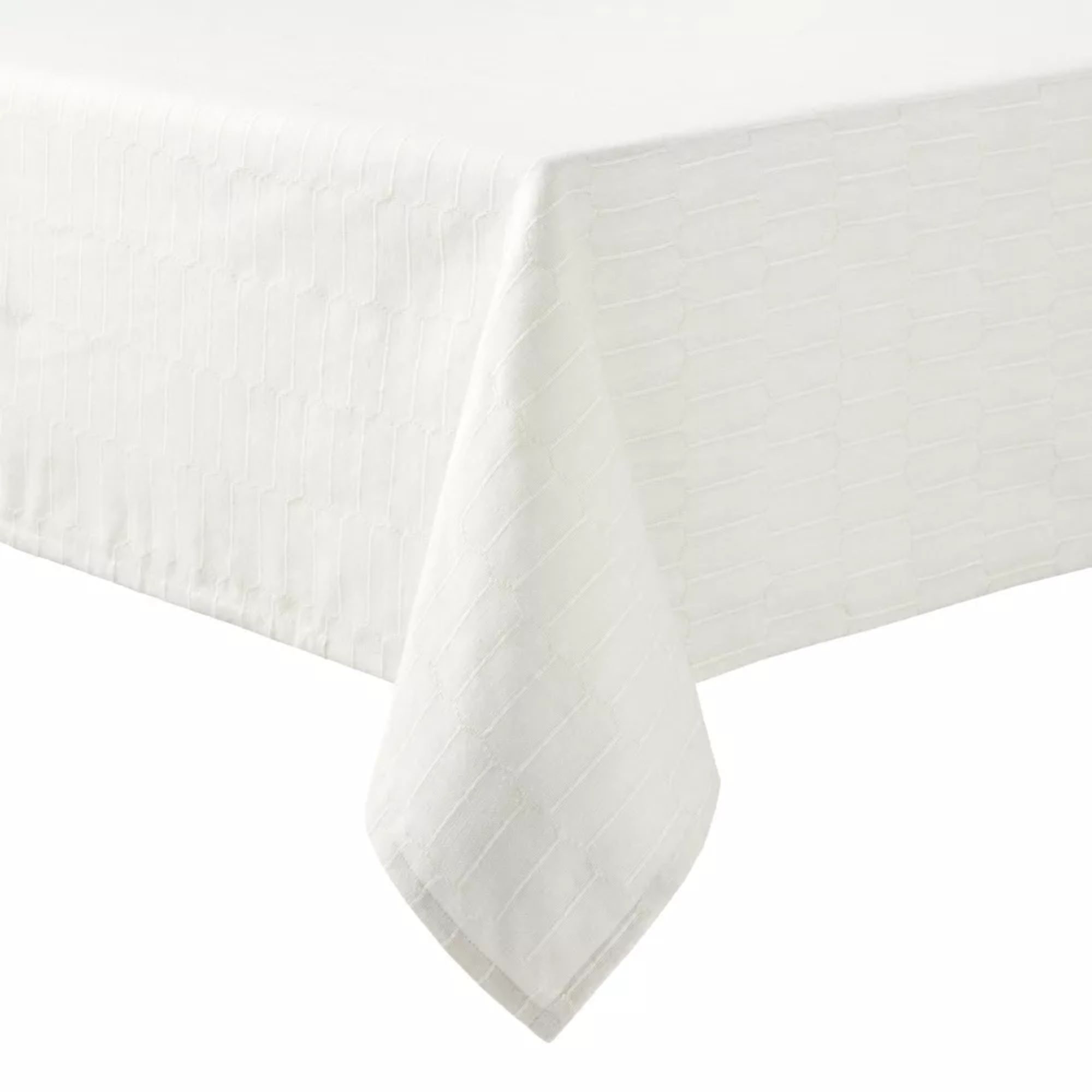 Cream tablecloth with embroidered honeycomb pattern