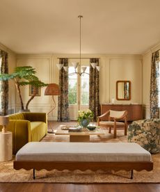 Eclectic living room with wavy bench, wavy light and yellow velvet sofa