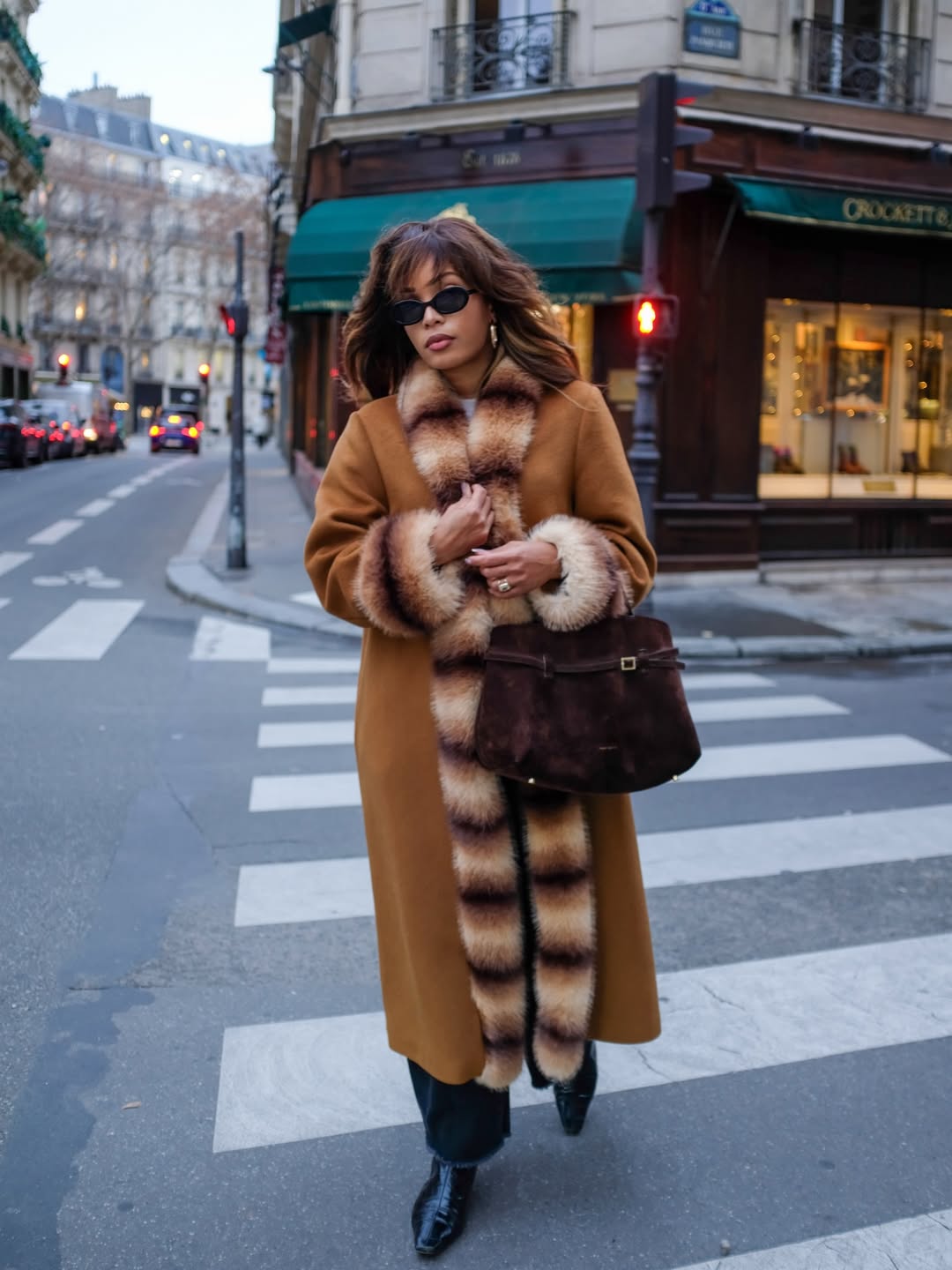 Ellie Delphine wears faux fur coat