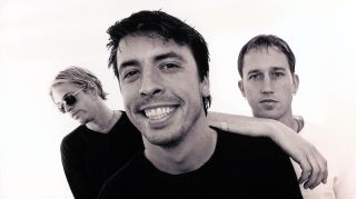 UNSPECIFIED - JANUARY 01: Photo of FOO FIGHTERS and Taylor HAWKINS and Dave GROHL and Chris SHIFLETT; Posed studio group portrait L-R Taylor Hawkins, Dave Grohl and Chris Shiflett, 362 (Photo by Mick Hutson/Redferns)