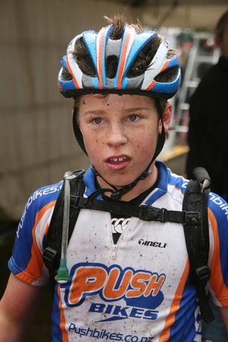 Anton Cooper, a junior, often beats the seniors in mountain bike races