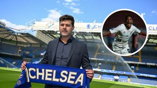Chelsea Head Coach Mauricio Pochettino poses for the photographer with a club scarf after holding a Press Conference at Stamford Bridge on July 07, 2023 in London, England.