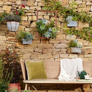 Garden wall with hanging planters