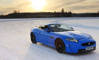 blue car on icy road