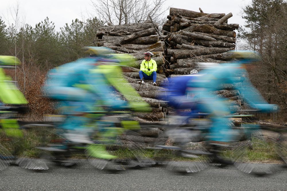 A spectator takes in the action during stage 2 at Paris-Nice