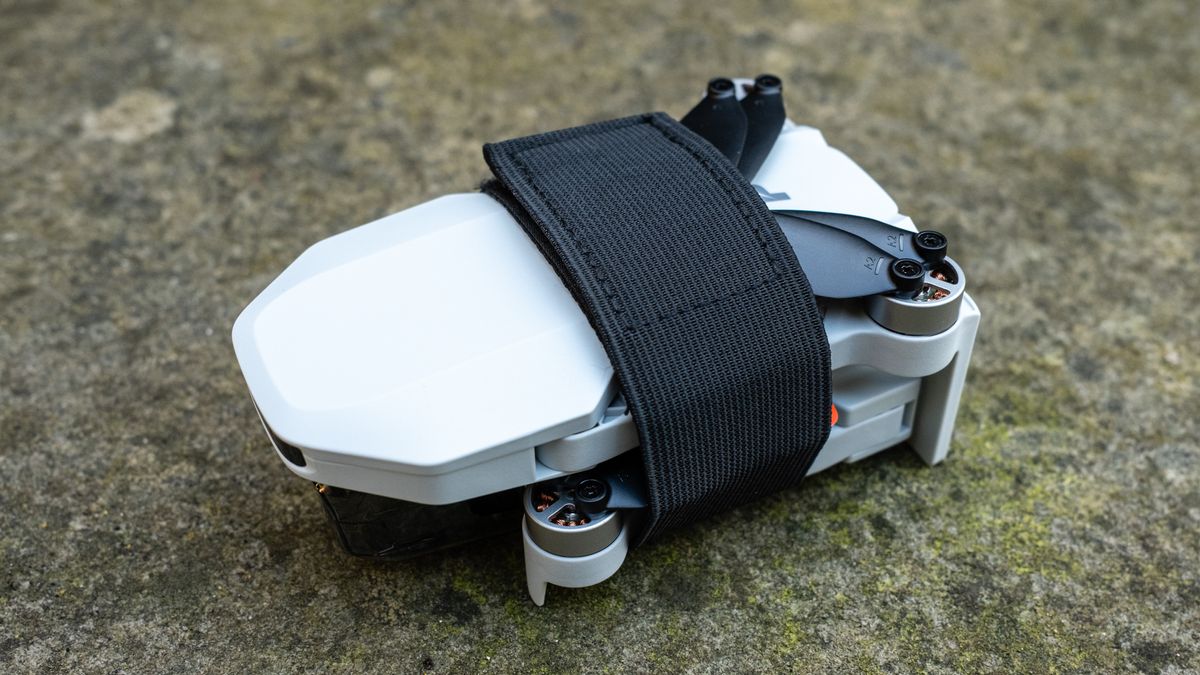 Potensic Atom 2 folded with the propeller strap attached