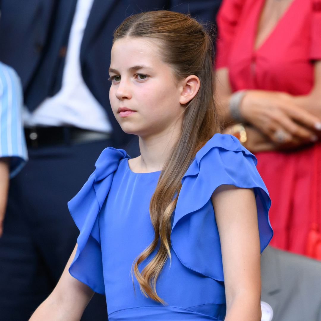 Princess Charlotte wearing a blue dress with ruffled sleeves