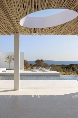 Outdoors area under straw roof in Paros