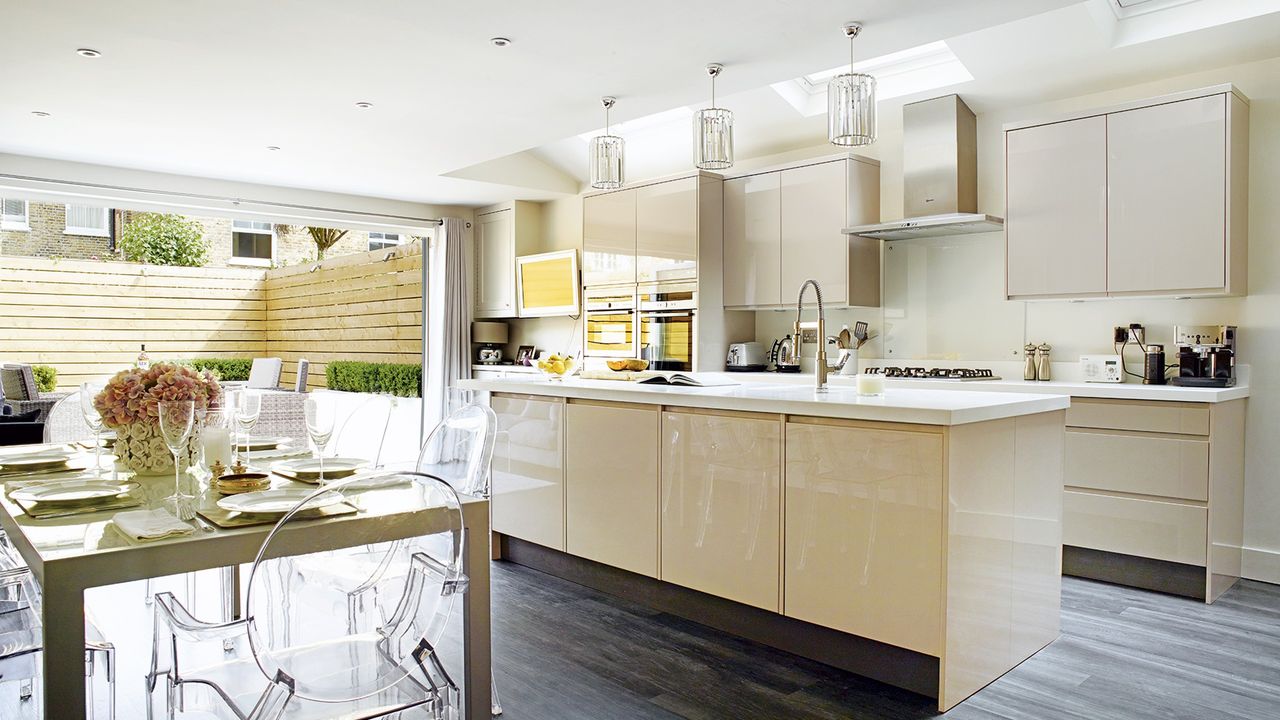 modular kitchen with dining area and chairs