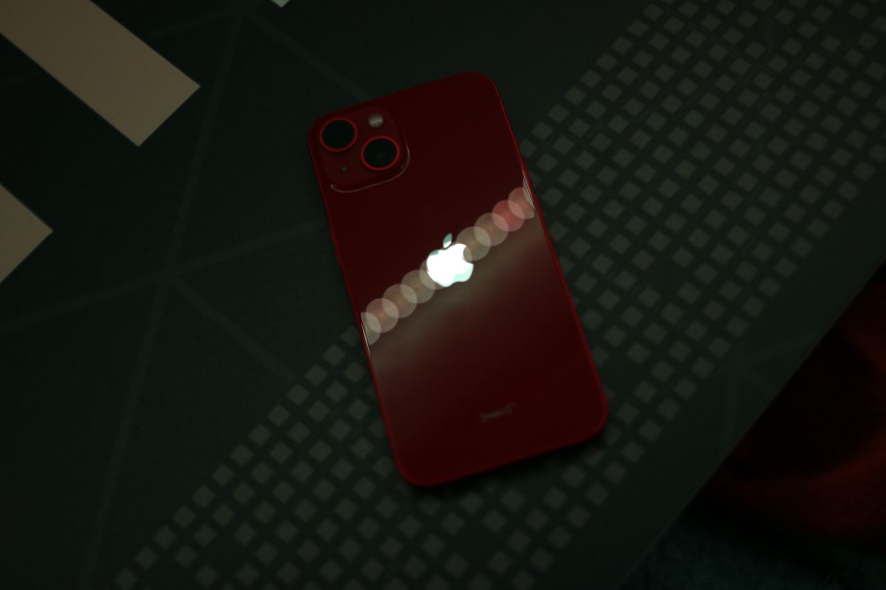 The iPhone's Apple logo illuminated