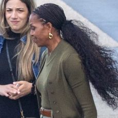 Michelle Obama wears cargo pants and carries a Bottega Veneta bag