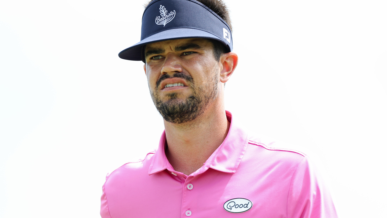 Beau Hossler walks off the green