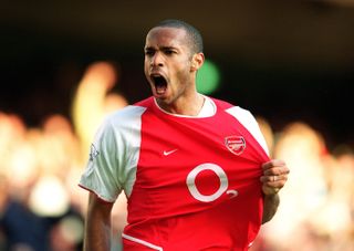 Thierry Henry celebrates after scoring for Arsenal against Chelsea in October 2003.