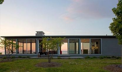 The shores of the Rappahannock River in Virgina sits a home at the convergence of three landscapes