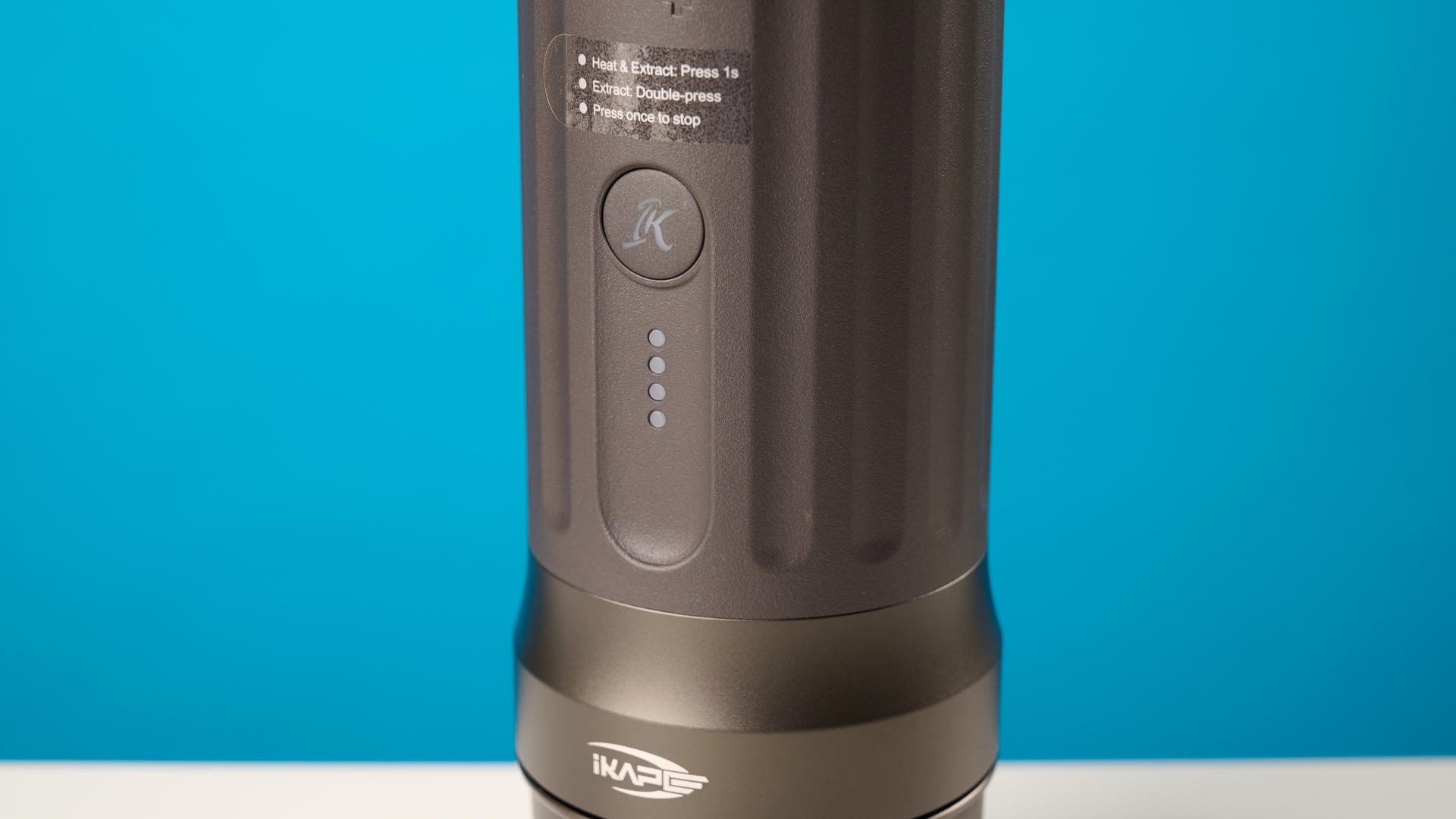the ikape kapo k2 pro portable coffee maker against a blue background