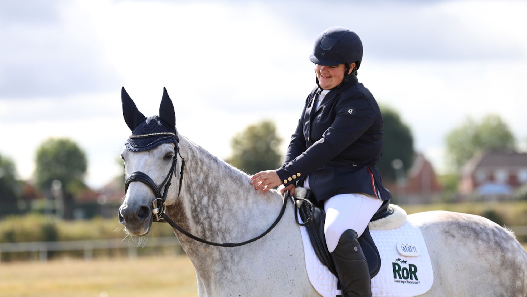 ‘I said I had to do something’: rider who lost five stone to compete her horse stands champion and qualifies for London