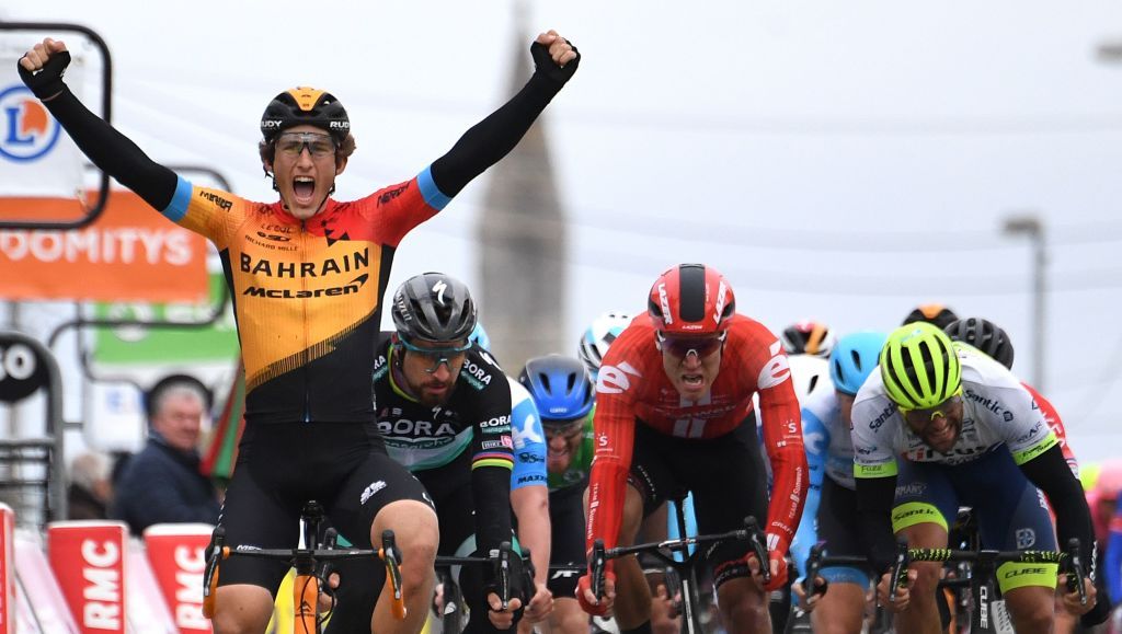 Bahrain McLaren Spanish rider Ivan Garcia Cortina L celebrates as he crosses the finish line at the end of the 2125 km 3rd stage of the 78th Paris Nice cycling race stage between ChalettesurLoing and La Chatre on March 10 2020 Photo by Alain JOCARD AFP Photo by ALAIN JOCARDAFP via Getty Images