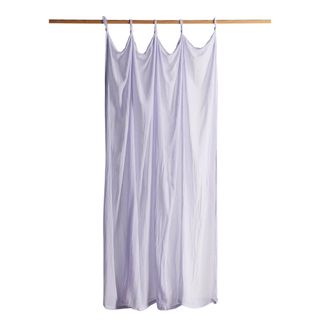 Light purple curtain hanging up