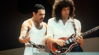 Freddie Mercury and Brian May of the band Queen at Live Aid on July 13, 1985 in London