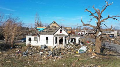 Photo of a home damaged by a tornado in Kentucky