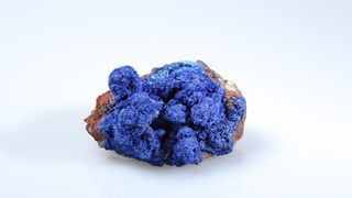Azurite is a copper carbonate hydroxide mineral known for its deep-blue color.