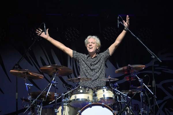 Stewart Copeland, arms aloft