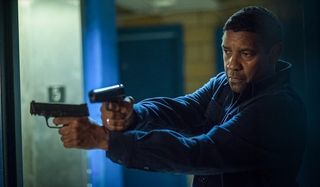 The Equalizer 2 Denzel Washington Robert peeks into the elevator with two pistols