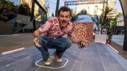 DJ Woody Cook interacting with Three UK's Raving Slabs pop-up