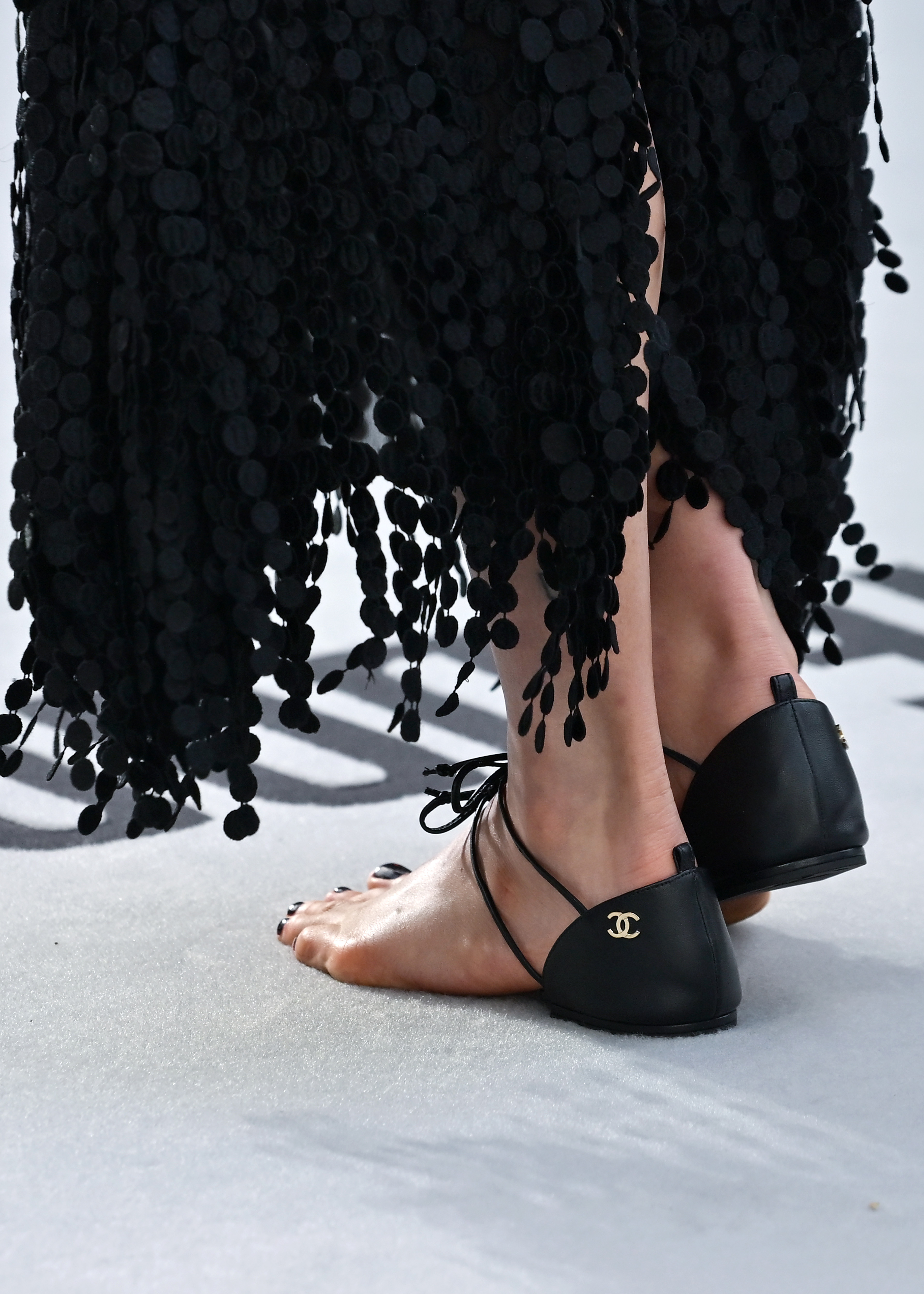 Margaret Qualley styled the barefoot Chanel sandals at the premiere of 'The Dog Stars'