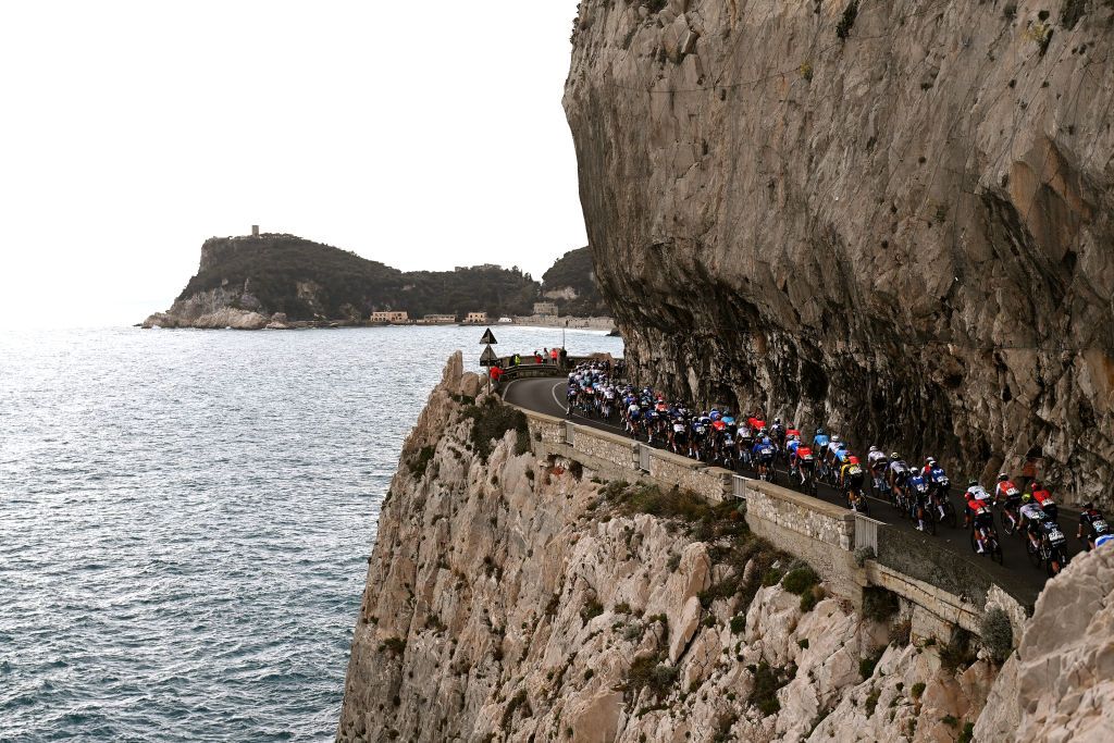 SANREMO ITALY MARCH 18 A general view of the peloton passing through a sea landscape during the 114th MilanoSanremo 2023 a 294km one day race from Abbiategrasso to Sanremo MilanoSanremo UCIWT on March 18 2023 in Sanremo Italy Photo by Tim de WaeleGetty Images