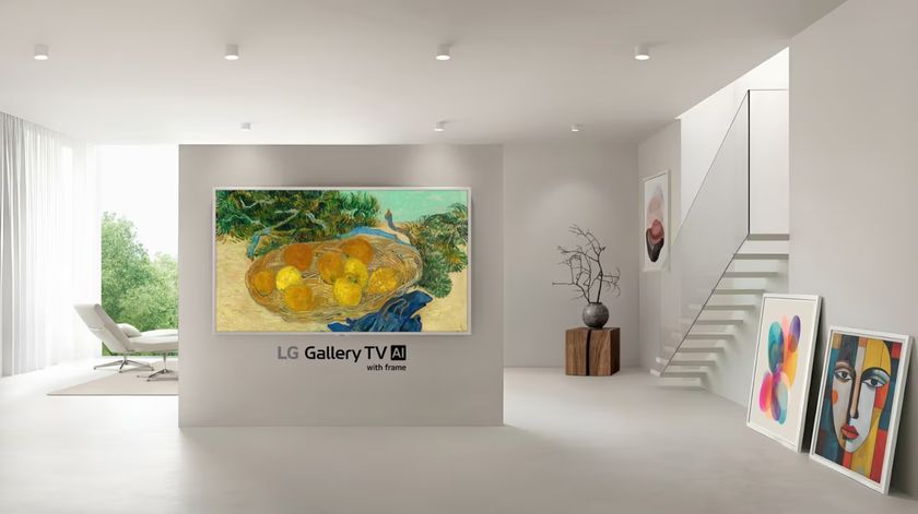 The 65-inch LG Gallery TV, pictured wall-mounted in a stark, white apartment