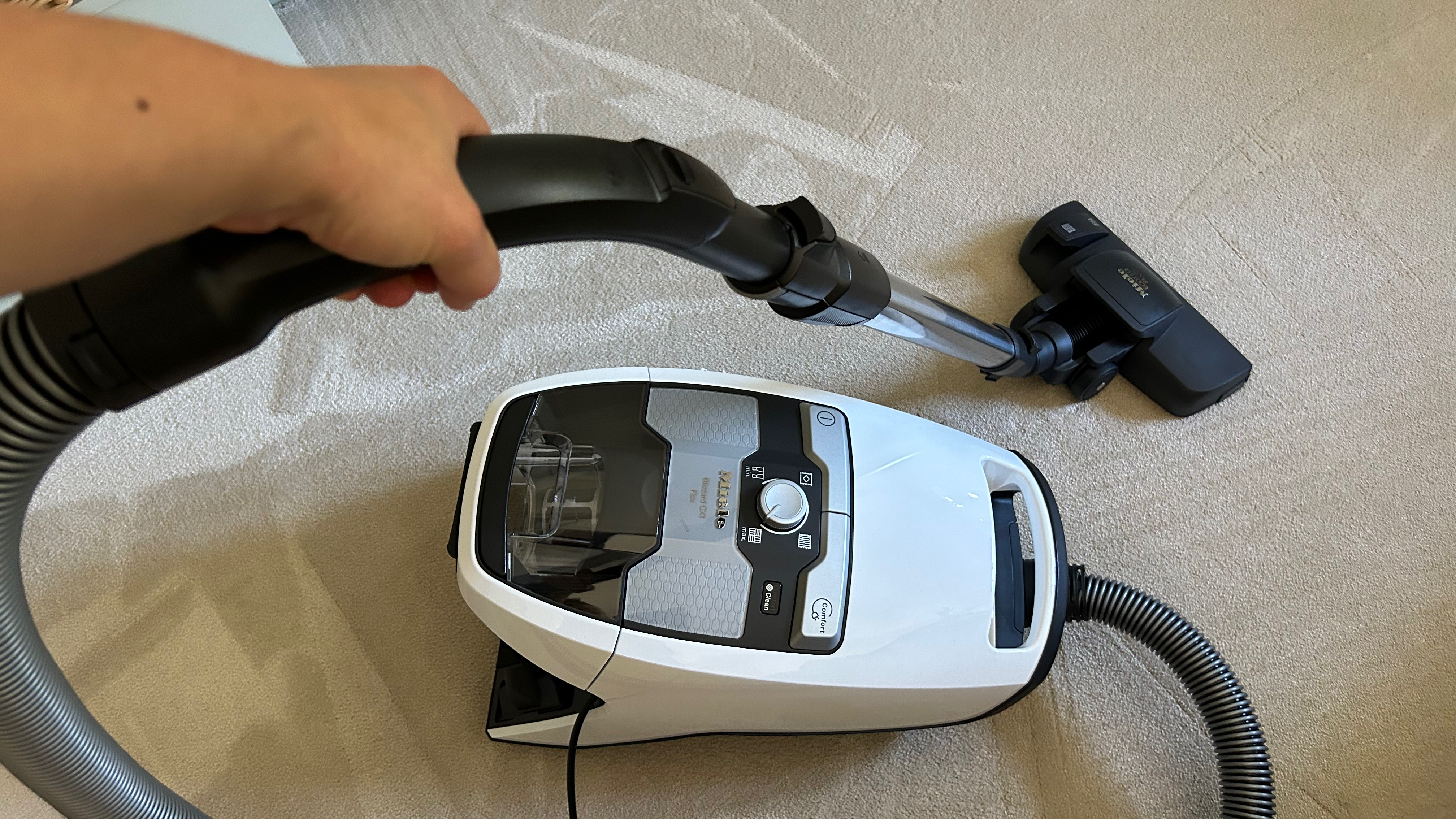 Miele Blizzard CX1 vacuuming carpet